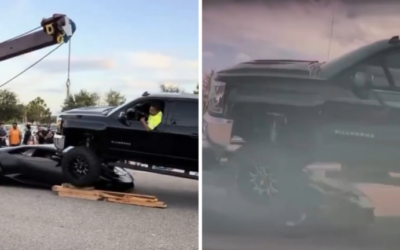 Un Chevrolet Silverado modificat se urcă pe un Lamborghini Huracan într-o parcare